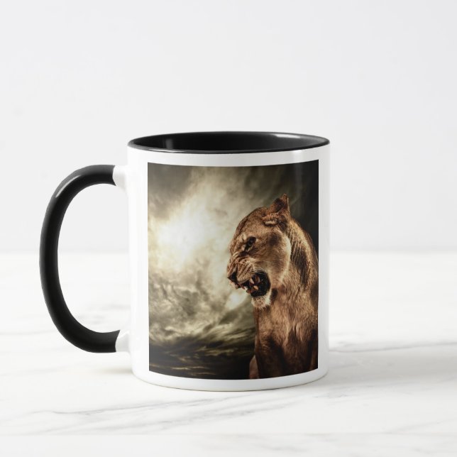 Roaring lioness against stormy sky mug (Left)