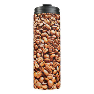 roasted aromatic coffee beans in sunlight, coffee  thermal tumbler