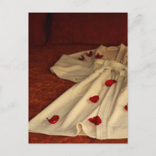 Robe, petals and bed postcard