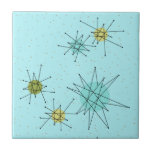 Robin's Egg Blue Atomic Starbursts Ceramic Tile<br><div class="desc">This Robin’s Egg Blue Iconic Atomic Starbursts Ceramic Tile pattern features iconic atomic starbursts. That’s right! The old school, robin’s egg blue coloured background with gold speckles is the perfect backdrop for the vibrant turquoise, soothing celery, and kitschy pear green coloured circles. The spots of colour are sporadically placed in...</div>
