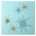 Robin's Egg Blue Atomic Starbursts Ceramic Tile<br><div class="desc">This Robin’s Egg Blue Iconic Atomic Starbursts Ceramic Tile pattern features iconic atomic starbursts. That’s right! The old school, robin’s egg blue coloured background with gold speckles is the perfect backdrop for the vibrant turquoise, soothing celery, and kitschy pear green coloured circles. The spots of colour are sporadically placed in...</div>