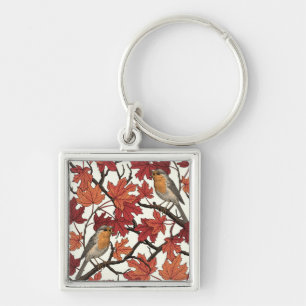 Robins in maple tree on off white key ring