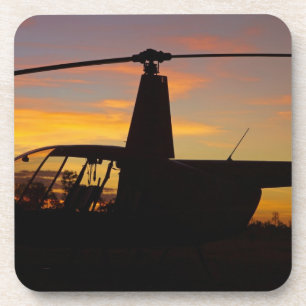 Robinson R44 helicopter at sunset Coaster