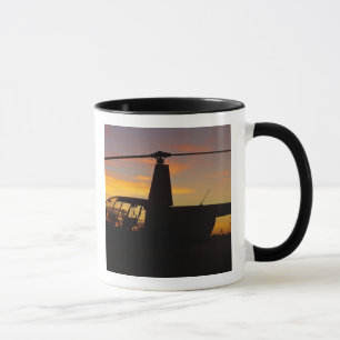 Robinson R44 helicopter at sunset Mug