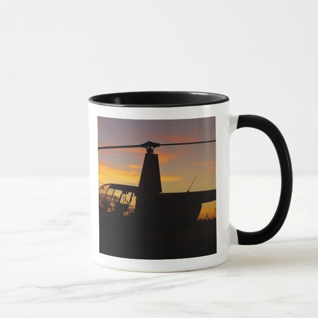 Robinson R44 helicopter at sunset Mug (Right)