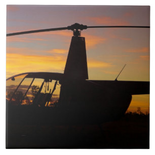 Robinson R44 helicopter at sunset Tile
