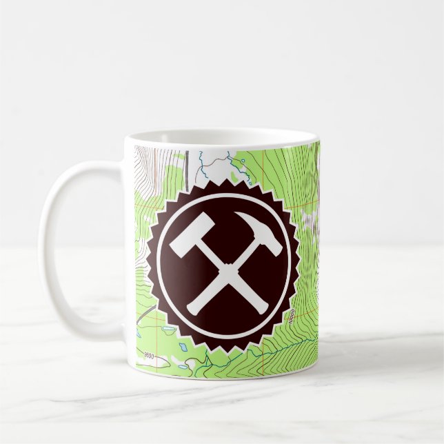 Rock Hammer Badge with Topo Map Coffee Mug (Left)