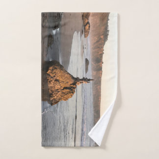 Rock sculpture at the beach in Big Sur, California Hand Towel