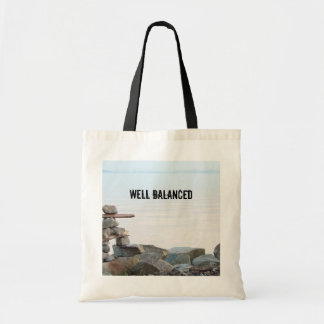 Rock stacking art by the beach. photo by Hao zhang Tote Bag