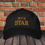 ROCK STAR embroidered baseball cap gold / black<br><div class="desc">Embroidered Hats: Classic golden / white fashion baseball cap with text "ROCK STAR" for the worlds best music stars,  band players,  college party,  beach rawe / festival hats</div>