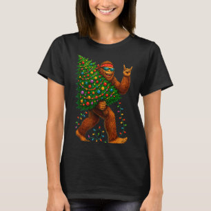 Rockin Christmas Bigfoot Carrying Tree Fun Xmas Ro T-Shirt