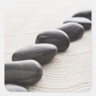 Rocks on sand square sticker