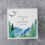 Rocky Mountain Destination Wedding Napkin<br><div class="desc">These Rocky Mountain destination wedding paper napkins are perfect for an outdoor wedding reception. The design features a blue and green painted wilderness landscape with watercolor pine trees, birds and mountains. Personalise the napkins with the names of the bride and groom, and the wedding date. These napkins can be used...</div>