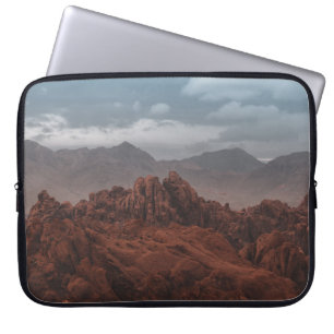 ROCKY MOUNTAINS UNDER GRAY SKIES LAPTOP SLEEVE