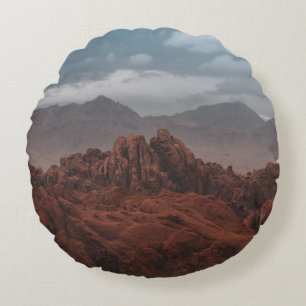 ROCKY MOUNTAINS UNDER GRAY SKIES ROUND CUSHION