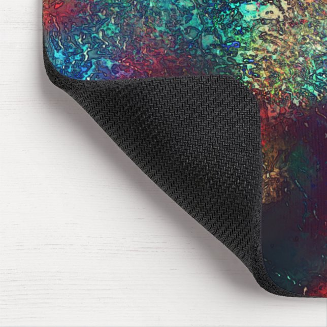 Rocky or aluminum foil under blue and red plastic  mouse mat (Corner)