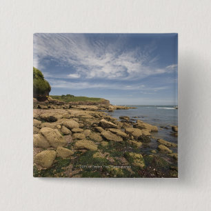 Rocky Seaside With Motorboat Travelling 15 Cm Square Badge