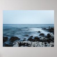 Rocky shore with misty water