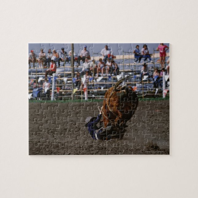 Rodeo rider falling from bull jigsaw puzzle (Horizontal)