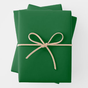 roll of solid dark green adhesive vinyl wrapping paper sheet