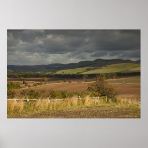 Rolling Hills And Mountains Under A Cloudy Sky Poster