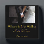 Romantic and Elegant Wedding Couple Holding Hands Plaque<br><div class="desc">Welcome to our wedding plaque. A romantic and elegant wedding photograph of a couple holding hands. The image focuses on the couples hands clasped together in love,  while wearing their fancy wedding attire. She in her wedding gown and he in his tux. Personalise with your own wedding details.</div>