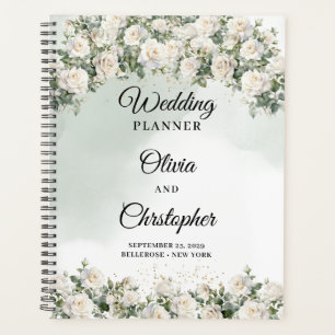 Romantic boho white roses and greenery wedding planner