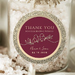 Romantic Burgundy Wedding Thank You Classic Round Sticker<br><div class="desc">Elevate your wedding favours with our chic burgundy thank you stickers. Featuring a romantic gold drawing of love birds and glittering gold accents,  these simple and elegant stickers are perfect for expressing your heartfelt gratitude. A beautiful touch for your special day!</div>