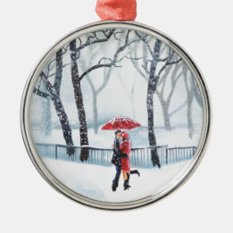 Romantic couple dancing in the snow red umbrella metal tree decoration