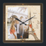 Romantic couple hugging near the eiffel tower square wall clock<br><div class="desc">Romantic couple hugging near the eiffel tower in paris Square Wall Clock.</div>