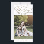 Romantic Gold Merry Christmas Photo Family News Holiday Card<br><div class="desc">This romantic gold merry Christmas photo family news holiday card is the perfect simple holiday greeting. The modern classic design features fancy swirls and whimsical flourishes with gorgeous elegant hand lettered faux champagne gold foil typography. Personalise the front of the card with a photo, your family name and the year....</div>