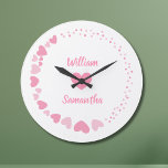 Romantic Heart custom Couple Name Love white  Large Clock<br><div class="desc">Celebrate love every second with this elegant personalised wall clock featuring a romantic design of pink hearts on a black background. The centre showcases two custom names above and below a heart motif, making it perfect for couples, anniversaries, weddings, or Valentine's Day. A thoughtful gift and a stylish addition to...</div>
