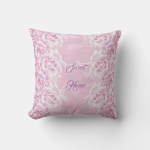 Romantic pale pink roses on pink camouflage cushion