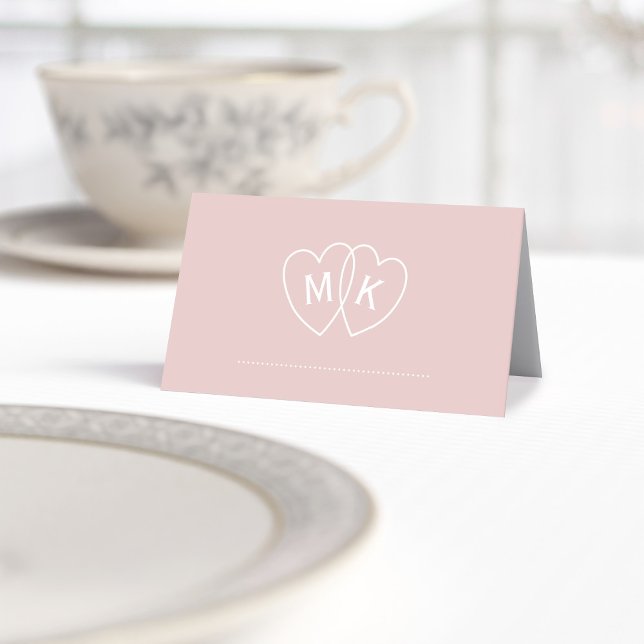 Romantic Pink Monogrammed Hearts Table Place Cards (A pretty blush pink wedding place card with space for your initials in the entwined hearts)