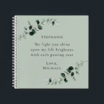 Romantic Quote Personalised Sage Eucalyptus Notebook<br><div class="desc">The Light You Shine Romantic Quote Personalised Eucalyptus Sage Green Notebook... The romantic inspirational saying on our custom design sage square notebook reads "The light you shine upon my life brightens with each passing year" in trendy serif typography. Bordering this text are watercolor eucalyptus branches in shades of sage and...</div>