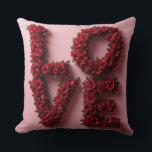 Romantic Red Rose 'LOVE' Floral Pillow<br><div class="desc">Elevate your home decor with this luxurious and romantic decorative pillow featuring the word 'LOVE' meticulously crafted from vibrant, deep red roses. Perfect for Valentine's Day, anniversaries, weddings, or as a year-round expression of affection. The stunning floral design is set against a soft pink backdrop, making it an eye-catching accent...</div>