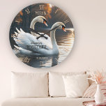 Romantic Swans Wedding Round Clock<br><div class="desc">Wall clock featuring a painting of two swans. The classic Roman clock numbers can be deleted if you do not need them. As swans are known to stay together for their entire life,  this a beautiful gift for a wedding or anniversary.</div>