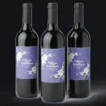 Romantic watercolor white flowers wedding custom wine label<br><div class="desc">Elegant and romantic customisable wine labels for your wedding reception, featuring a beautiful bouquet of white gentle watercolor flowers, over a classy periwinkle purple background. Easily edit the template fields to add the bride and groom names in a modern white script, and your wedding date in a stylish all-caps font....</div>
