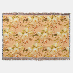 Romantic white roses on orange throw blanket