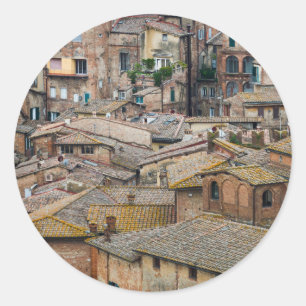 Roofs in Siena round sticker
