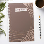 Rose Gold and Mauve Abstract Trendy Personalised Planner<br><div class="desc">Stay organised in style with this rose gold and mauve abstract trendy personalised planner. Perfect for women who love chic and contemporary designs, this planner combines elegance with functionality. The modern abstract pattern and luxurious rose gold accents add a touch of sophistication to your daily planning. Personalise it with your...</div>