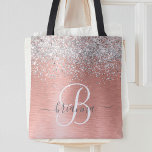 Rose Gold Brushed Metal Glitter Monogram Name Tote Bag<br><div class="desc">Easily personalise this trendy chic tote bag design featuring pretty silver sparkling glitter on a rose gold brushed metallic background.</div>