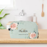 Rose gold floral greenery name monogram dopp kit<br><div class="desc">A green coloured background,  black and golden text. Decorated with watercolored rose gold roses,  eucalyptus greenery and golden sprigs. 
Personalise and add your first name,  monogram initials and full name.</div>