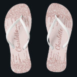 Rose gold glitter drips name script flip flops<br><div class="desc">A blush pink background. Rose gold,  pink faux glitter drips,  paint dripping look as decoration.   Personalise and add a name. The name is written with a modern hand lettered style script.</div>