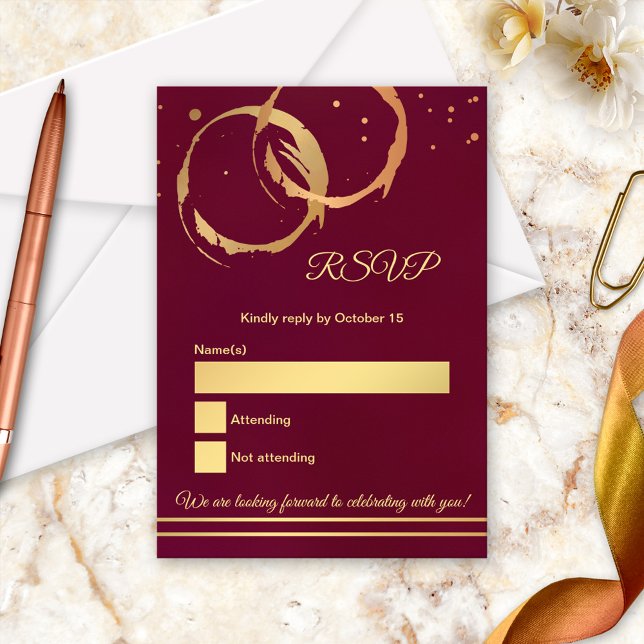 Rose Gold Wine Stain Marsala Wedding RSVP Card (RSVP card featuring gold and rose gold intersecting wine stains with confetti on burgundy)