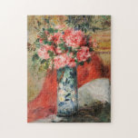 Roses and Peonies in a Vase | Renoir Jigsaw Puzzle<br><div class="desc">Roses and Peonies in a Vase (1876) by Pierre-Auguste Renoir (French, 1841–1919) is a lush and sensuous still life that captures the Impressionist master’s love of colour, light, and natural beauty. The bouquet overflows with soft, full blooms—roses and peonies rendered in radiant pinks, reds, and creamy whites—gathered loosely in a...</div>