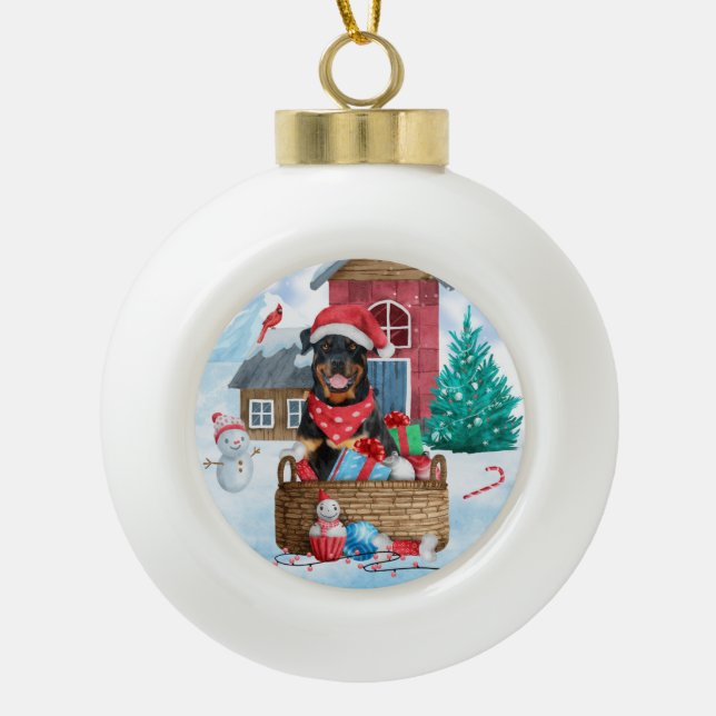 Rottweiler Dog In snow Christmas Dog House Ceramic Ball Christmas Ornament (Front)