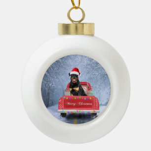Rottweiler Dog in Snow sitting in Christmas Truck  Ceramic Ball Christmas Ornament
