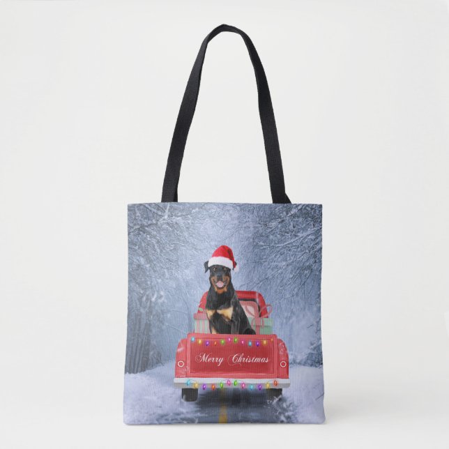 Rottweiler Dog in Snow sitting in Christmas Truck Tote Bag (Front)