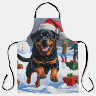 Rottweiler Running in Snow with Christmas Hat Apron